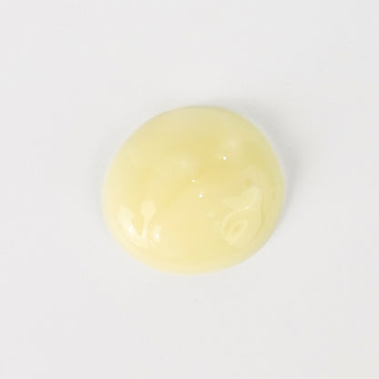 Romige, lichtgele textuur van de Vitamine C Serum